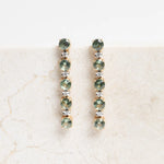 Statement oorbellen met groene saffier en diamant