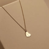 Initial Heart Token 14 karaat goud, Objet Dore